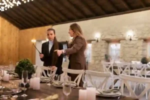 Female Wedding Planner Working on Ceremony Setup