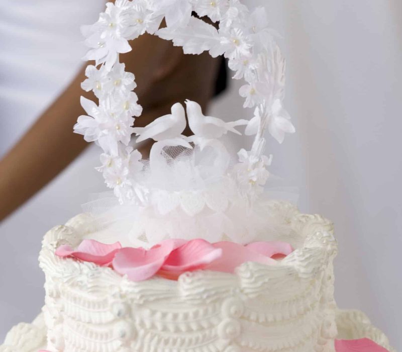 Close-up of wedding cake topper