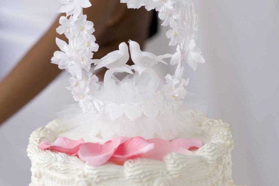 Close-up of wedding cake topper